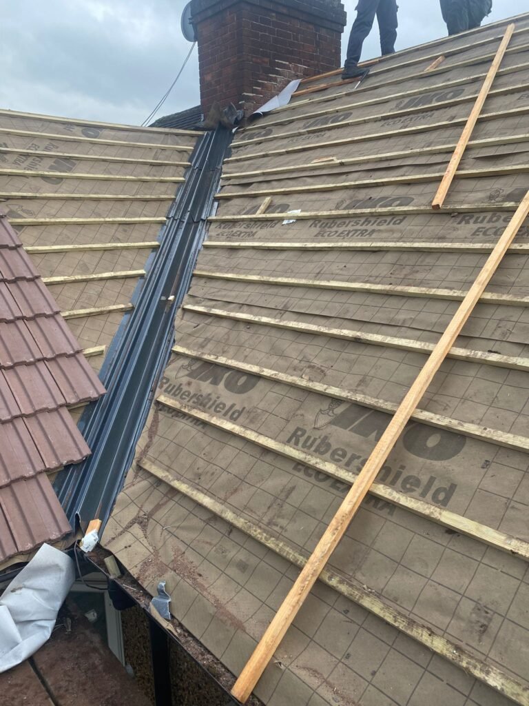 Slate roof installation by experienced Devonshire roofers Slate roof installation by experienced Devonshire roofers