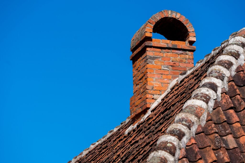 Chimney repointing on traditional Devonshire home Chimney repointing on traditional Devonshire home